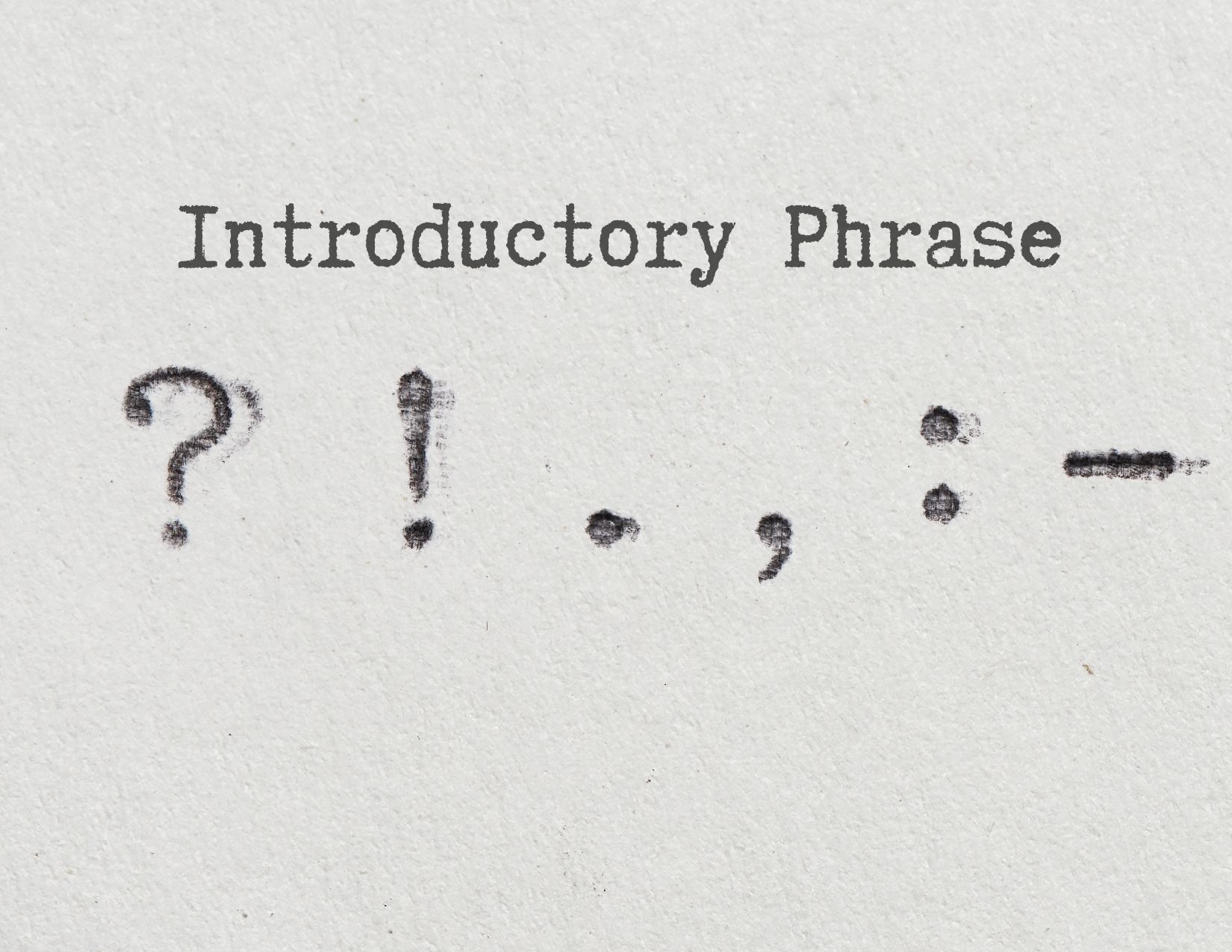 Image showing the words Introductory Phrase followed by various punctuation marks: question mark, exclamation point, period, comma, etc.
