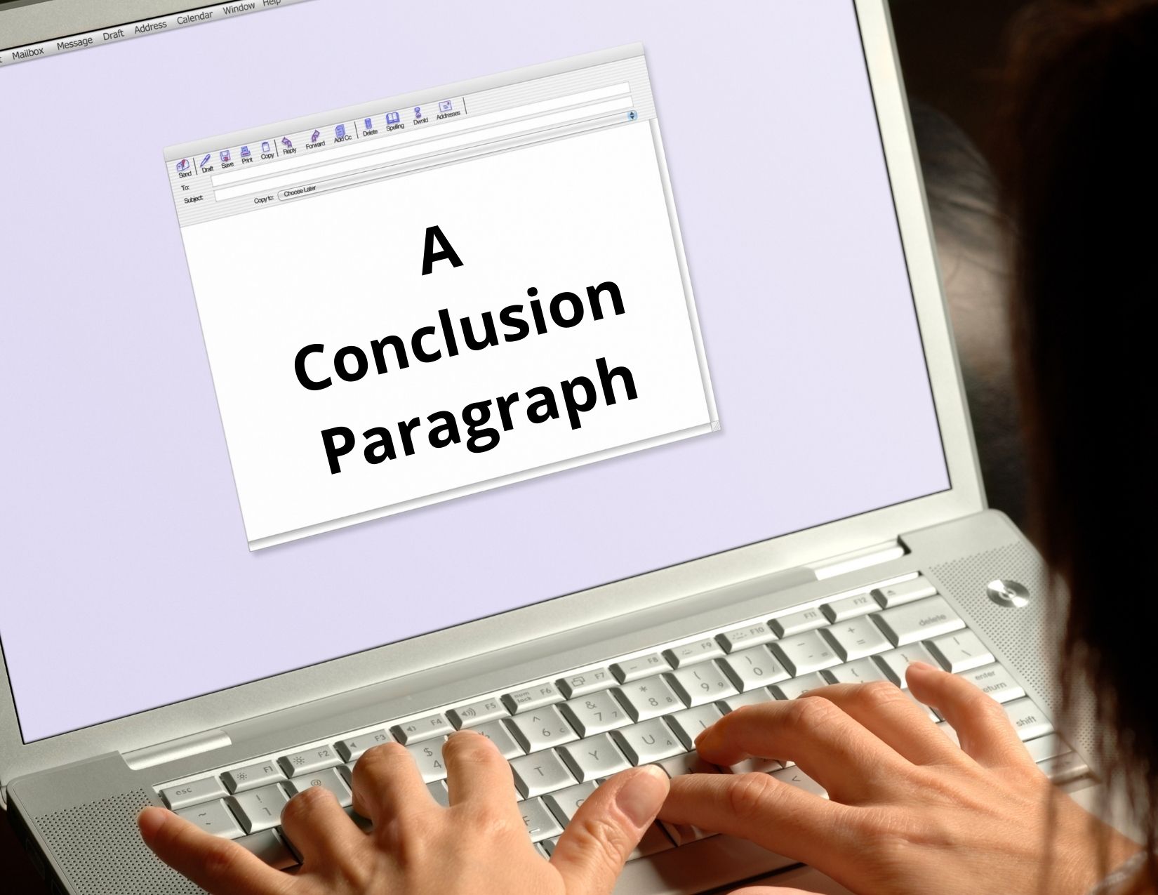 A picture of a computer with a window open and the words: A conclusion paragraph.