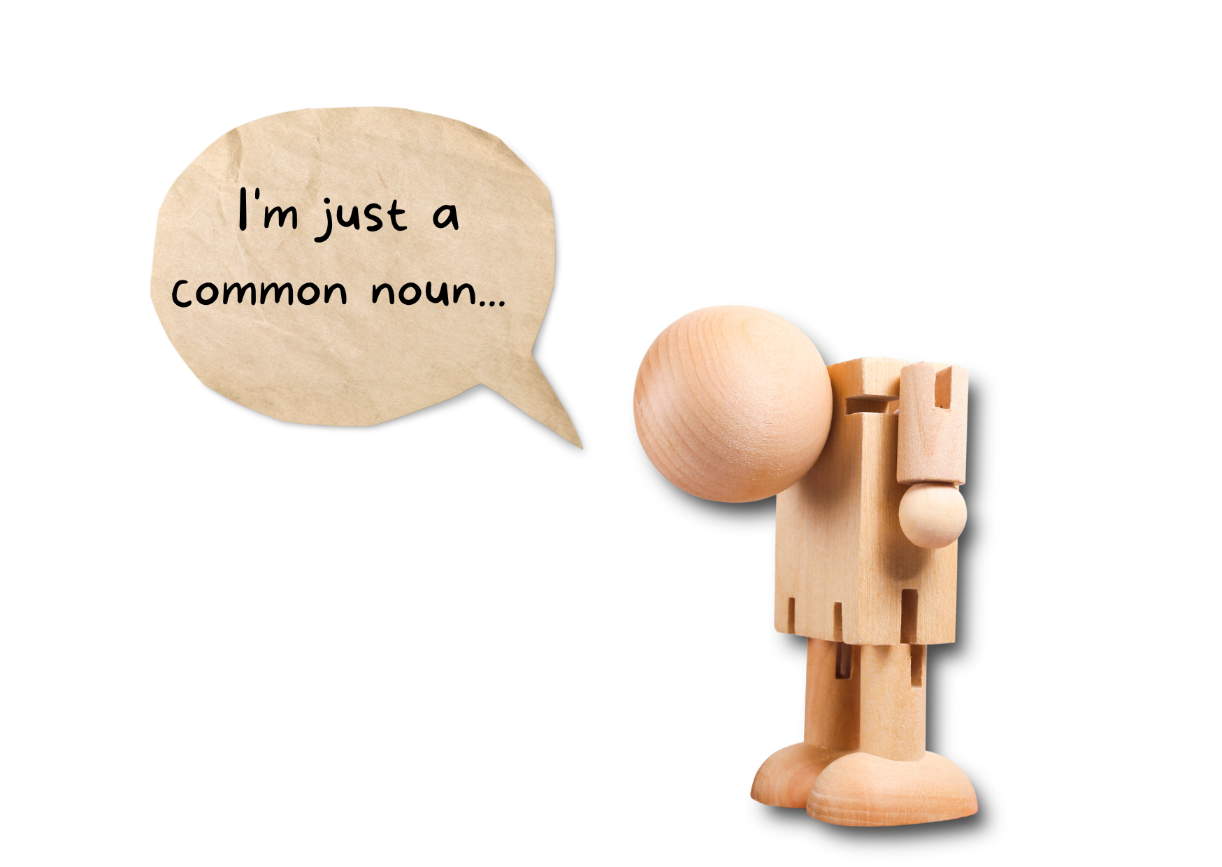 a picture of a wooden figurine with his dead down and a speech bubble with the text: "I am just a common noun"